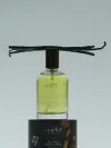Flacon d'huile de soin relipidant et apaisant sur une boite d'infusion blend équilibre - Rituel équilibre sur le corps et l'esprit